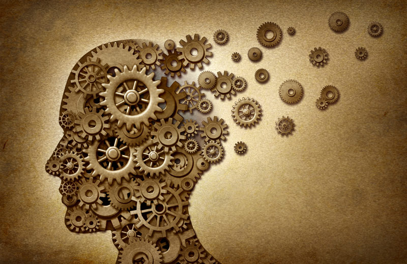A collage full of gears that looks like a human head.